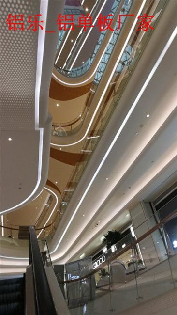 龙华电梯包边3D铝单板厂家做法解析——铝乐建材助力电梯安装品质升级